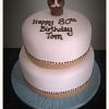 Monk topper birthday cake