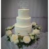Buttercream wedding cake with fresh flowers