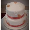 Coral accents wedding cake